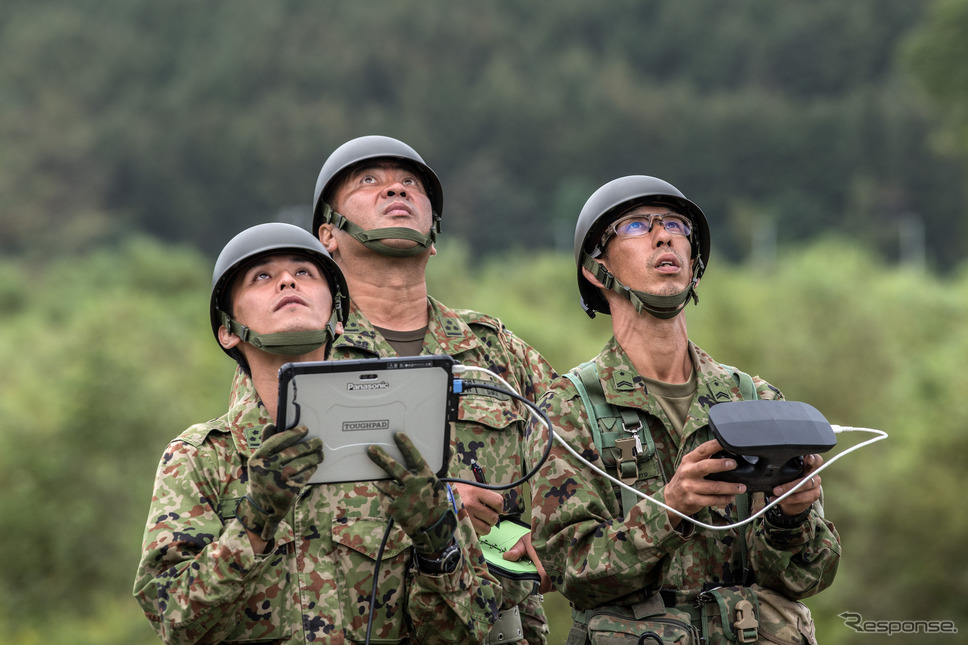 ドローンを飛ばす自衛隊。平成30年北海道胆振東部地震(9月8日撮影、北海道厚真町) (c) Getty Images