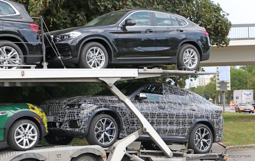 BMW X6 新型(下)とX4(上)。サイズの違いがよくわかる《APOLLO NEWS SERVICE》