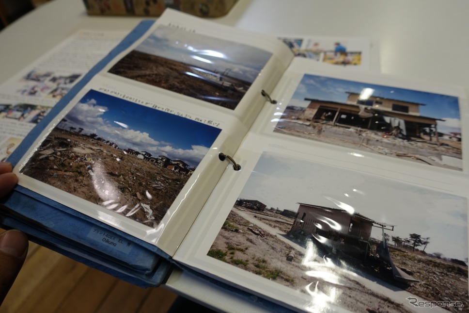 活動を通しての写真が納められたアルバム。クルマが紡いだご縁の結晶だ。《撮影 中込健太郎》