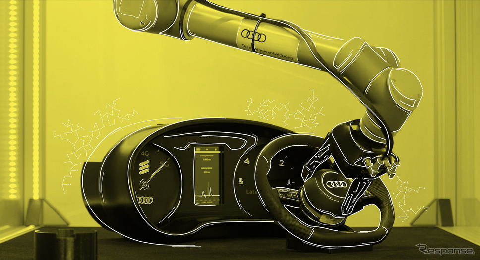 5G通信で動くロボットがエアバッグモジュールをアウディ車のステアリングホイールに取り付け《photo by Audi》