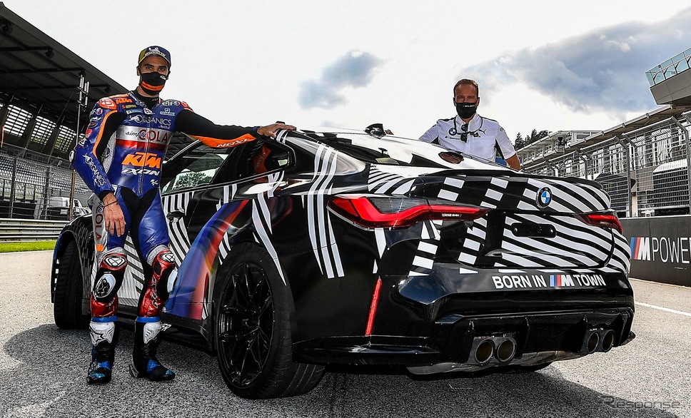 BMW M4 クーペ 次期型とMotoGPのミゲル・オリベイラ選手《photo by BMW》