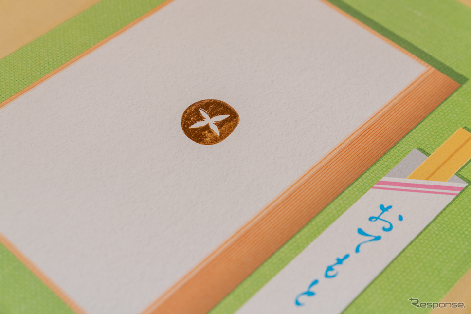 からっぽの弁当箱のイラストに押せば、弁当のおかずを詰め込んだようになる。《写真撮影 関口敬文》