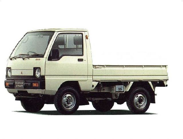 Mitsubishi баку. Mitsubishi Minicab 1990. Mitsubishi Mini Truck. Миникаб Митсубиси бортовой. Мини грузовик Мицубиси Миникаб.